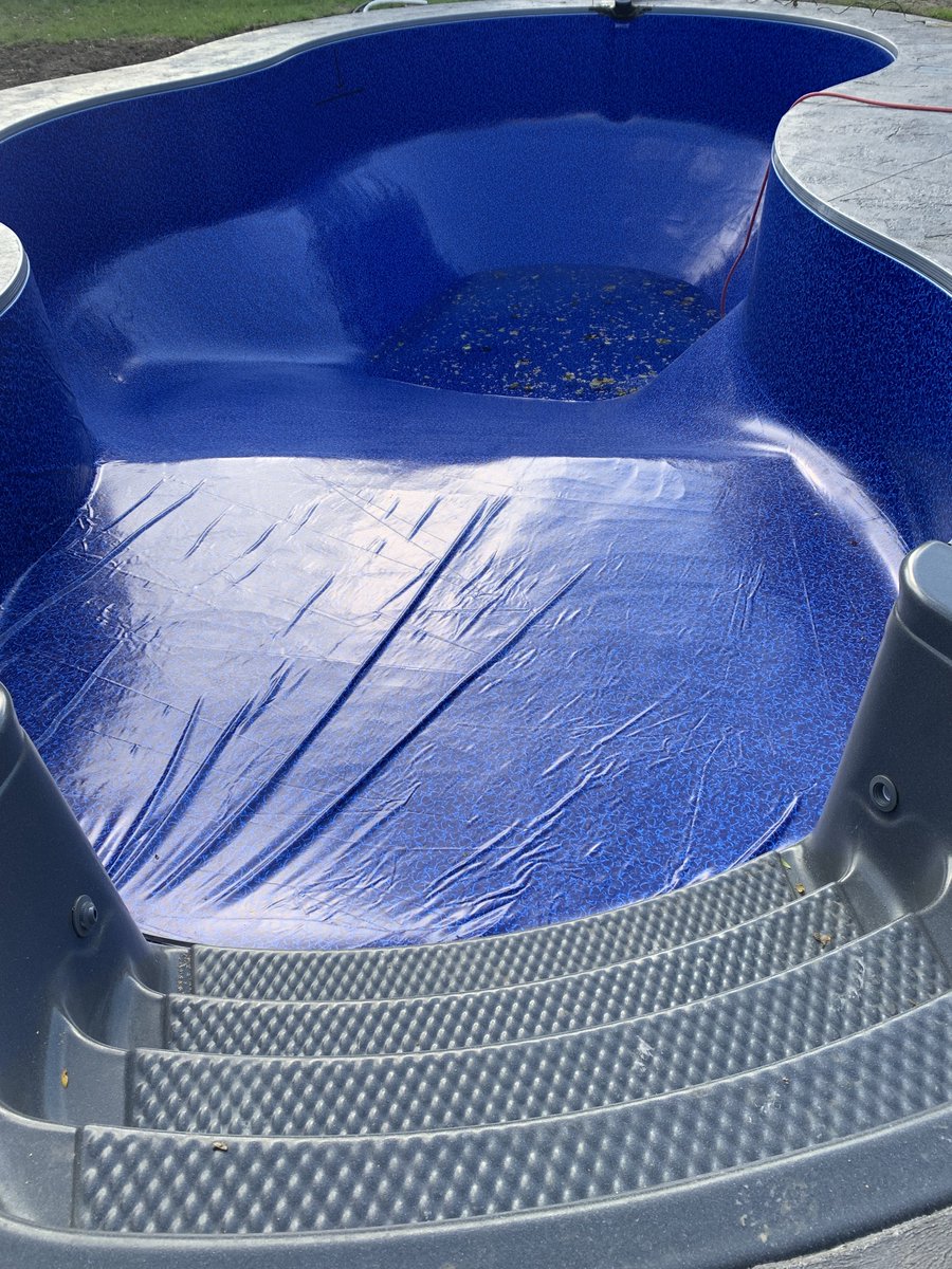 McKennaPool's tweet photo. #PoolCue - a new pool liner install should NOT have wrinkles. These should be worked out prior to cutting in the stairs and definitely before filling with water. There should also be another vacuum in the shallow end. https://t.co/yomm9G3ElX