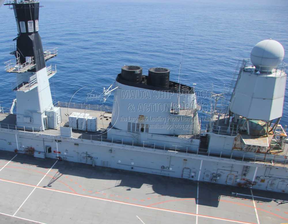 Shipguru's tweet photo. #RoyalNavy #Aircraft_Carrier and former #flagship #HMS #ARK_ROYAL #R07 #towed by #Greekowned #offshoretugsupplyship #CHRISTOS_XXIII #underway to #breakers - 05.06.2013 - https://t.co/nfgboxc3g3 - NO PHOTOS can be used or manipulated without our permission https://t.co/GT7tZr0JrF