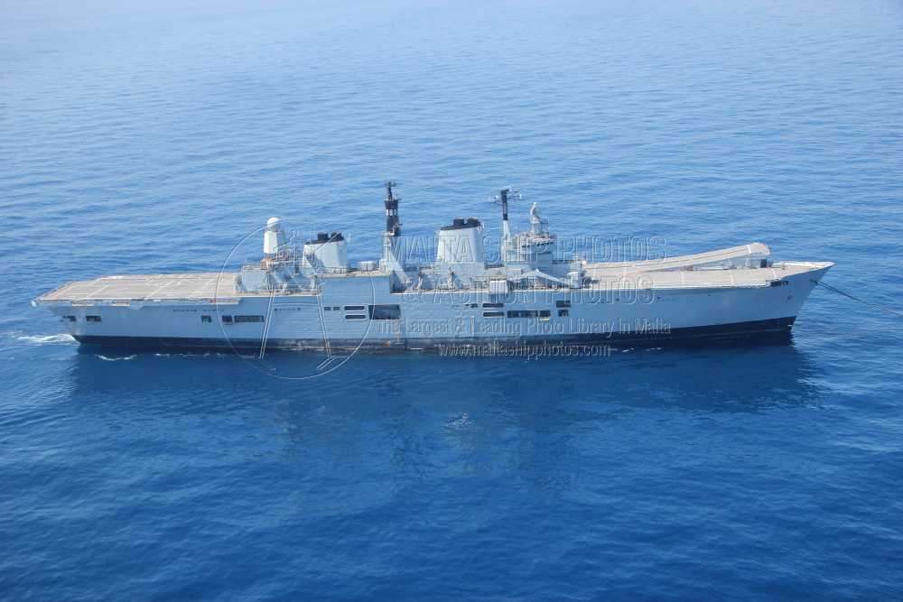 Shipguru's tweet photo. #RoyalNavy #Aircraft_Carrier and former #flagship #HMS #ARK_ROYAL #R07 #towed by #Greekowned #offshoretugsupplyship #CHRISTOS_XXIII #underway to #breakers - 05.06.2013 - https://t.co/nfgboxc3g3 - NO PHOTOS can be used or manipulated without our permission https://t.co/GT7tZr0JrF