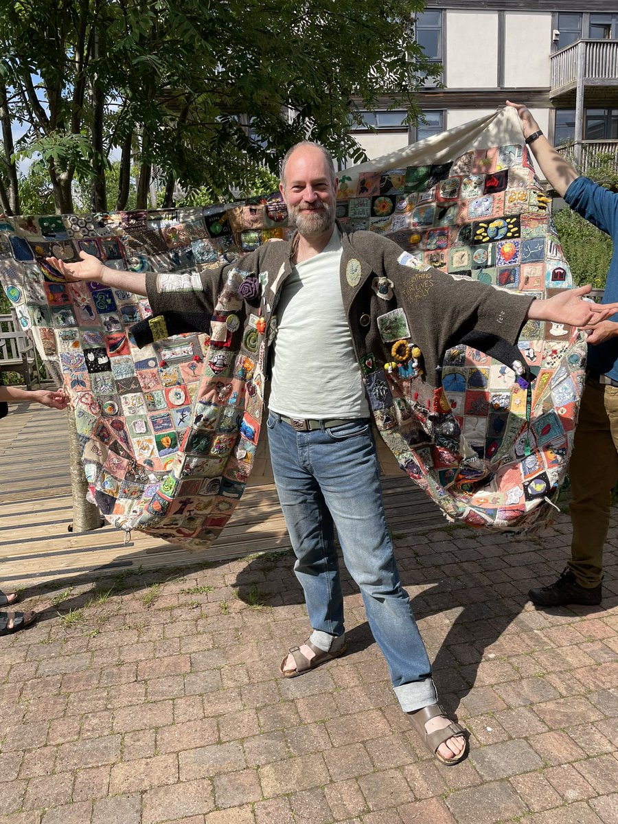 lilacleeds's tweet photo. The lovely Coat Of Hope visited us today, all neighbours had a quick try on, of course Eden of @StoriesAlive took to showing it off. https://t.co/SbOI2ol9Kx