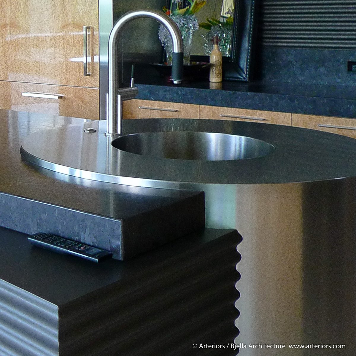 House_Architect's tweet photo. Couldn't find the perfect kitchen sink so we had one fabricated as a giant stainless steel cylinder https://t.co/Pl5Y553EHk