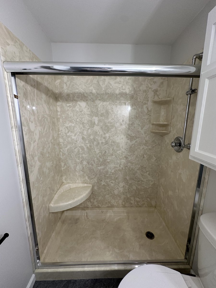 CRSaintLouis's tweet image. Transforming our outdated cultured marble shower into a sleek and modern oasis. Loving the fresh look! #bathroomrenovation #modernshower #upgrade