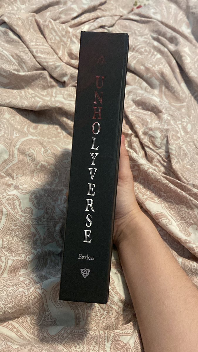 PALEXEGO's tweet photo. HERE SHE IS !!!!!! my physical unholyverse is here and she is STUNNING! so happy the formatting worked out, the colors on the cover are not as vibrant as I’d like so I may edit and order another one but overall I am very happy! more pictures below ⬇️ https://t.co/GGMe8P7iQC