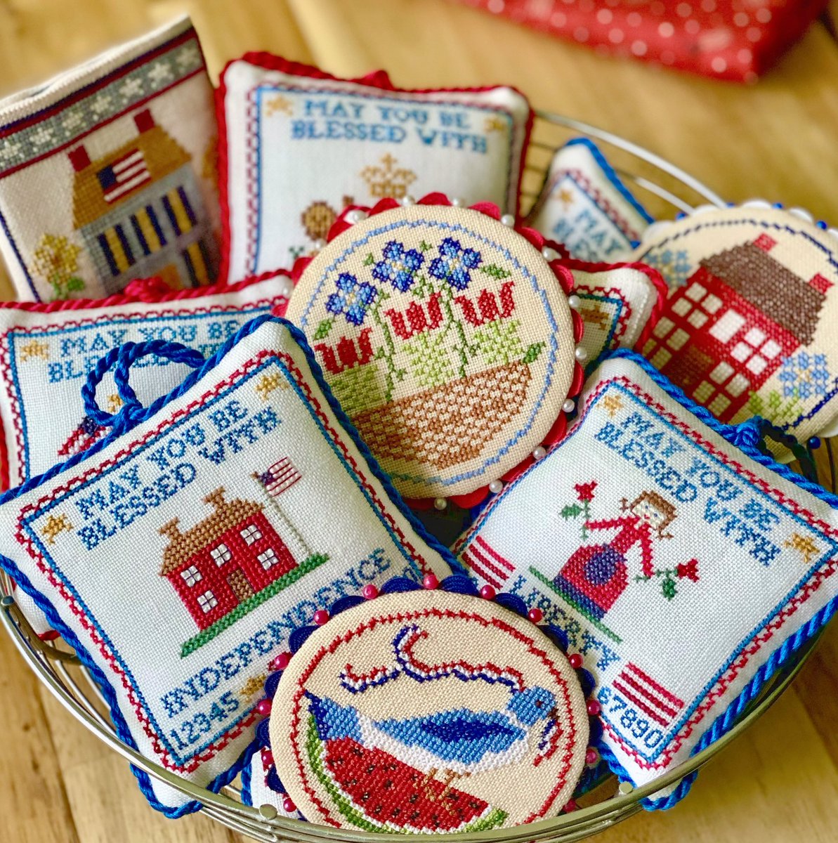 BlueRibbonXS's tweet photo. I’ve been working on designs for the coming months, but had to take a break and get my patriotic wire bowl back on display for summer…

A little sampling of BRD needlework smalls: Sweet Slice of Liberty, Patriotic Wishes 1 &amp; 2, and Holiday Helpings.
https://t.co/UXSB5GXI7C) https://t.co/IxuvLwtoTc