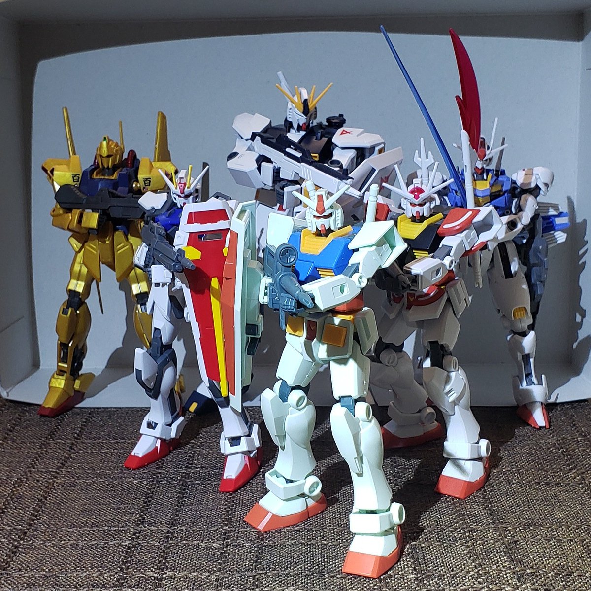 IAmDaveBaldwin's tweet photo. Here are some of the #Gunpla models I've built in the past month or so. Cheaper than beer, and the gang is all here. https://t.co/FbpgrKXezk