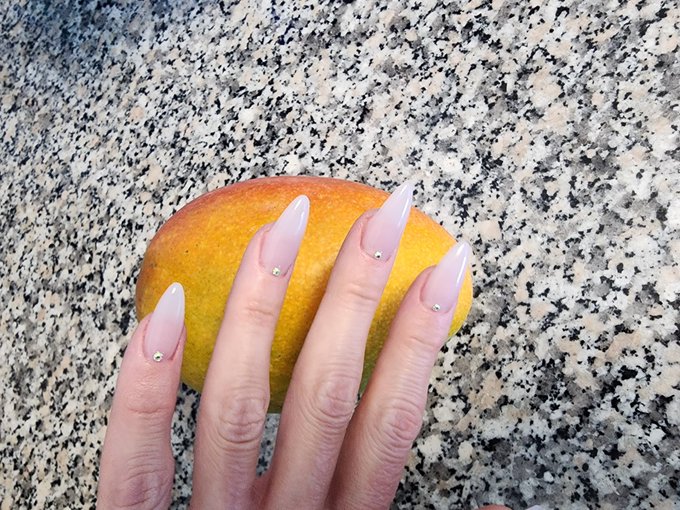 ho nail magic &amp; a mango from Luna's mom's tree 🥰✨️ https://t.co/8rAvi5LUWC