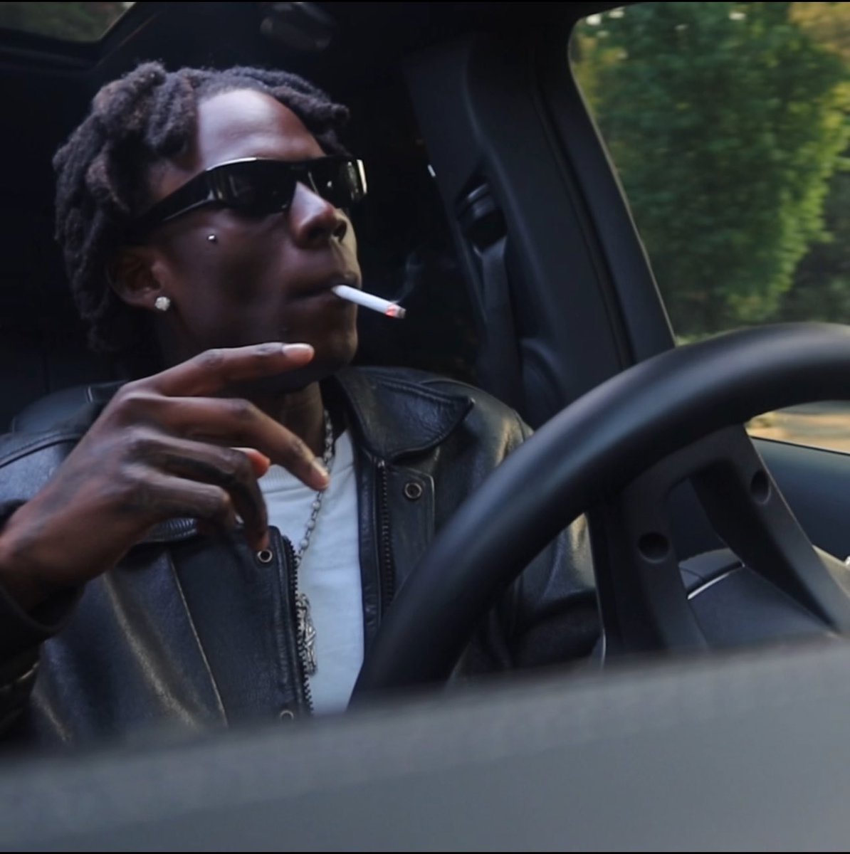 rema smoking cigarettes Rema and his new Maybach