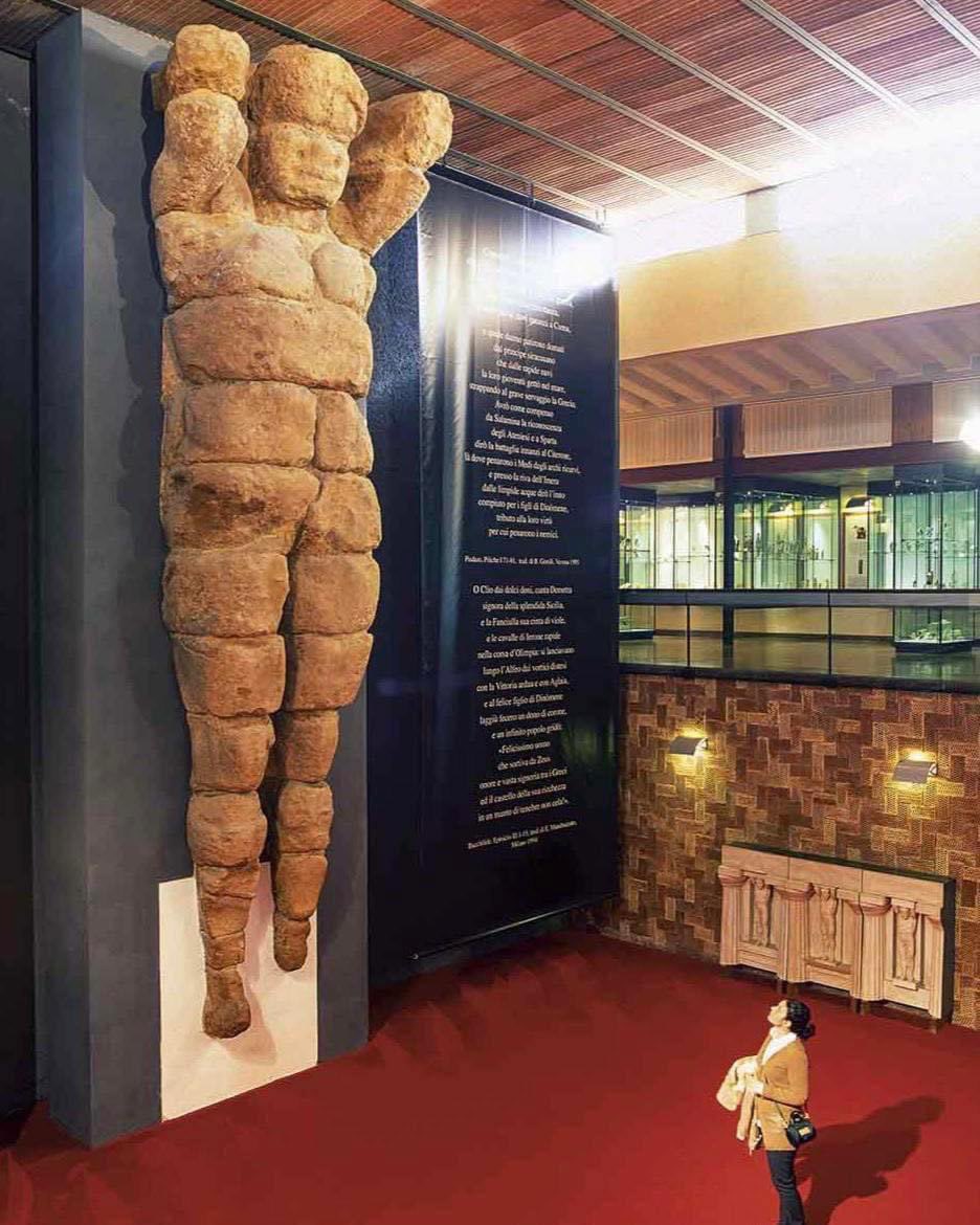 artifactmuseum's tweet photo. One of the massive atlases from the temple of Zeus (480s BCE), the largest Doric temple ever constructed, although it was never completed and now lies in ruins in Agrigento, Sicily. There were 38 such figures incorporated into the architecture of the building and each stood 7.5 m https://t.co/eCskwiRgEP