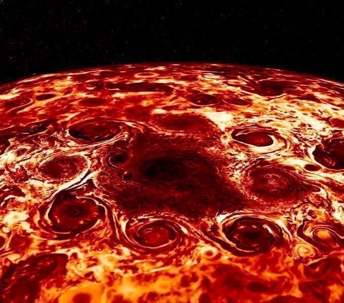 Cyclones at Jupiter’s North Pole.

A massive central cyclone encircled by eight cyclones.