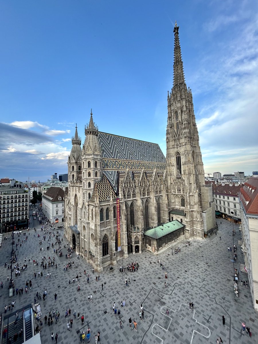 ChrisMccracken_'s tweet photo. St Stephen’s Cathedral, Vienna. Seems to be missing fenced off surface car parks, poorly executed public space &amp; derelict buildings. It’s also strangely populated by masses of people enjoying their evenings with loads of hospitality &amp; outdoor dining within a beautiful paved Sq. https://t.co/8hXmMrb8fe