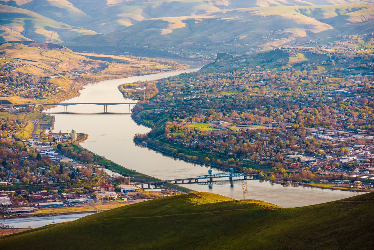 CascadeDistrict's tweet photo. CLARKSTON, a town in Asotin County, on the opposite bank of the Snake River from Lewiston, Idaho. It is named in honor of Captain William Clark of the Lewis and Clark Expedition, 1808-1806. It is a fine honor for the two leaders of that great expedition to have their names thus borne by thriving cities connected by an interstate bridge. Clarkston was begun with the name of "Concord," as some of the promoters of the irrigation plans had their homes in Concord, Massachusetts. By petition of the citizens the name was changed to Clarkston on January 1, 1900.
Meany, Edmond S. Origin of Washington Geographic Names. University of Washington Press, 1923.