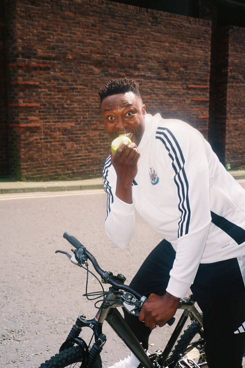 adidasUK's tweet photo. “Getting invited to capture BTS at the NUFC x adidas shoot was an absolutely mental experience. 

“I shot portraits of his lordship Alan Shearer. I captured Shola recreating the famous 'training ground apple bite on a bike' shot. And that doesn’t even scratch the surface.” https://t.co/jL4s26DvVZ