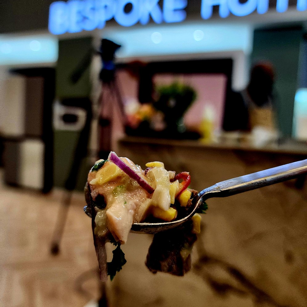 SamsungSA's tweet photo. Esto es Ceviche 🤌; a beautiful medley of sour, sweet, salty, tamed by the inclusion of fresh avocado. Bravo Chef Dion 👏, Chef Rio & the rest of the #SamsungBespoke Cooking Theatre audience rate this dish an 11/10! @decorexSA #DecorexCT #CulinaryMasters #Decorex2024 https://t.co/i6PduLbxrL