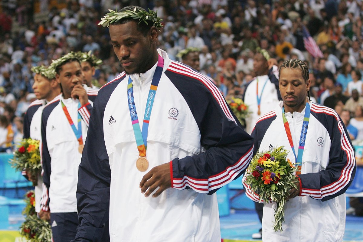 SportsIn2000s's tweet photo. 2004 Olympics. USA just won a bronze in men's Basketball. They know how bad it is. https://t.co/COtRebjUKT