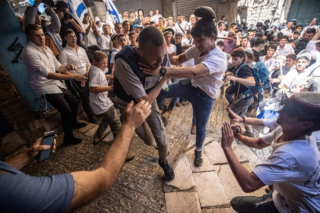 amasad's tweet photo. Every year Israelis go around Jerusalem hunting Palestinians to torture and abuse.

Think Spanish “running the bull” with all its cruelty but directed at humans.

This event is supported by their government and police (and of course US taxpayer).

The victim here was arrested. https://t.co/RpnV2NKGmC
