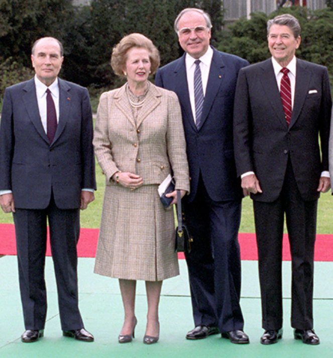 Adrian_Hilton's tweet photo. Imagine Mrs Thatcher in Normandy to commemorate the bravery and sacrifice of our D-Day heroes, with President Reagan, President Mitterrand and Chancellor Kohl. She wouldn't dream of telling Douglas Hurd to stand in for her so she could get back for an interview with Brian Walden. https://t.co/204WAJy5eV