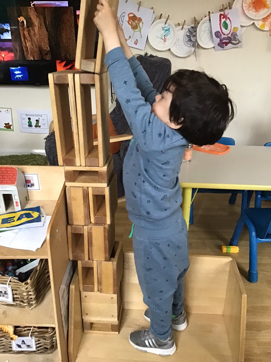 We have been reading ‘the three little pigs’ this week and so we made our own houses by sticking the windows and doors on. We also made houses in our construction area!