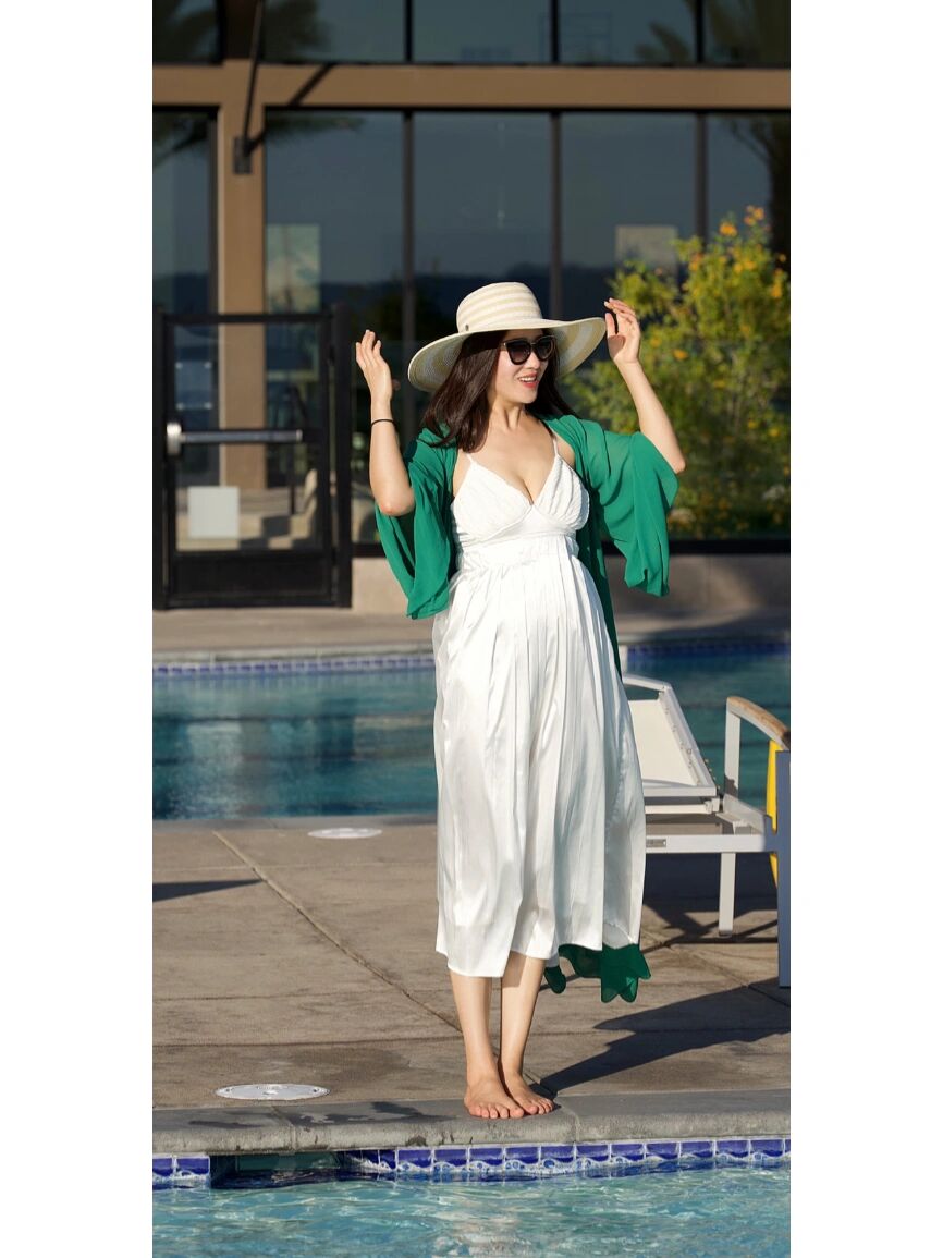 My best friend’s arrival at my pool party fills me with joy. Her presence makes everything more enjoyable, and I’m delighted, enjoying every moment together.
