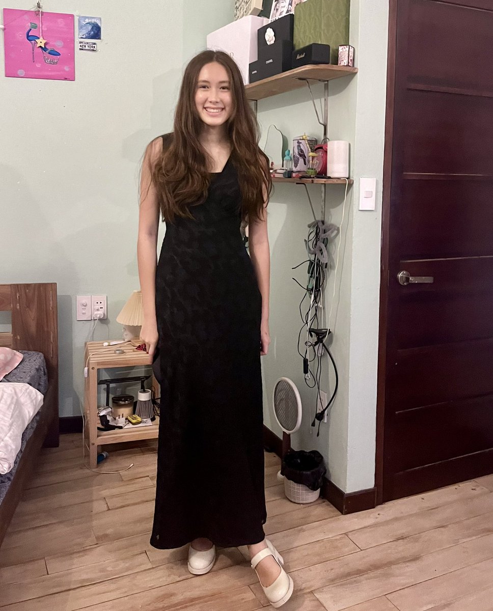 My kid, off to her BFF’s Year 10 prom in a dress I wore on New Year’s Eve 1993. The dress is over twice her age #momlife