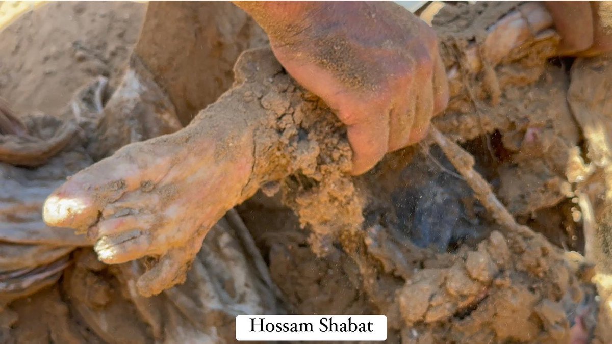 Graphic | After Israeli occupation forces withdrew from the area, Palestinians discovered a mass grave in Jabalia refugee camp in northern Gaza, where Israeli forces, using bulldozers, buried dozens of Palestinians they had executed.