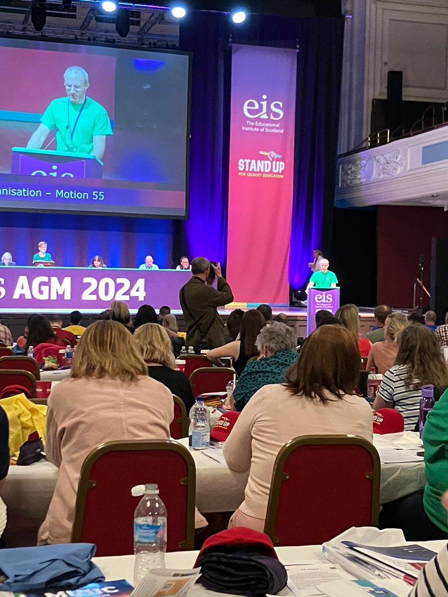 EisHighland's tweet photo. Tom Coles, Highland delegate, speaking to motion 55-  calling upon council to to negotiate with COSLA/ScotGov for a national approach on reporting and recording violent incidents towards school staff members
#EISAGM24 #SU4QE https://t.co/lJBoBC2RHz