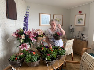 HCCEastArea's tweet photo. What a great day we've had at the balfour centre making hanging baskets. Thank you to all residents who came! Remember to water your baskets when you get them home.  Here's the lovely Pat of @PFH_Hull Humber view with a selection of the community baskets made today. #Drypool. https://t.co/EBfUeN4zJZ