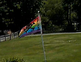 MalwareJake's tweet photo. The @defcon pride flag flying in the breeze at our place. https://t.co/IkCzbswqxI