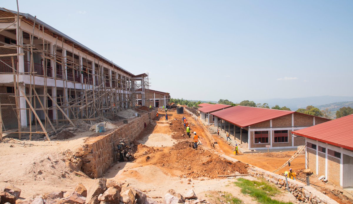 RwandaEmergency's tweet photo. Today, PS @P_Habinshuti and @NzabonimpaEmmy, Mayor of @GicumbiDistrict, visited ongoing construction works for Giti TVET School. The progress is at 87% &amp; set to accommodate around 500 students, and will offer courses in trades of Automobile Technology and Building Construction. https://t.co/70LrZE0VRV