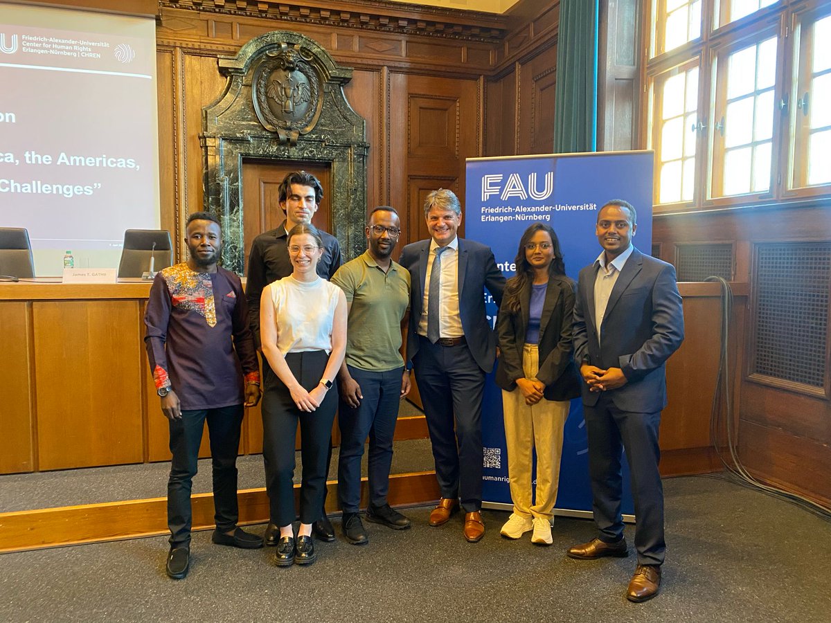 Hornegger's tweet photo. Excited to welcome everyone to today's panel discussion on #HumanRights Courts in Africa, the Americas, and Europe: Trends and Challenges. #FAU and @NurembergAcadem are happy to host this event in the historic Courtroom 600 at the Nürnberg Palace of Justice. @UniFAU https://t.co/bKXjH646CU