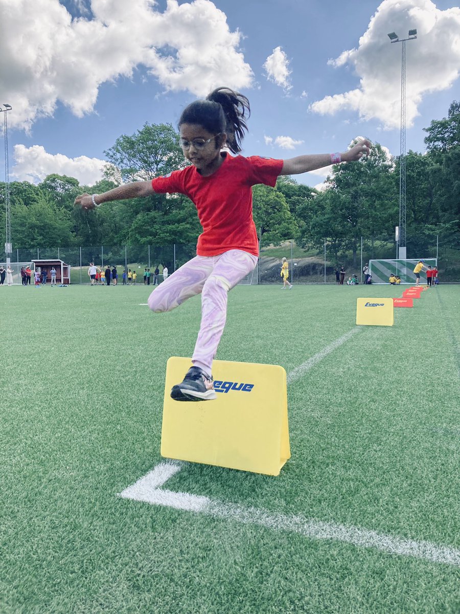 The children compete in different events to earn points for their team.