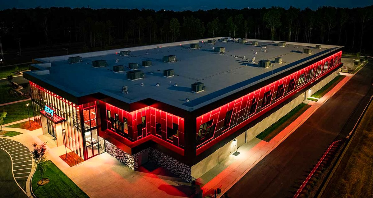 FOS's tweet photo. A look inside Airspeed—the new North Carolina HQ for Michael Jordan and Denny Hamlin’s 23XI Racing:

• 114,000 sq. ft.
• Weight room, sauna
• MJ and Hamlin memorabilia
• Windows with a 23-degree tilt
• Conference room with 45 pairs of Jordans https://t.co/Ec1lqECF5V