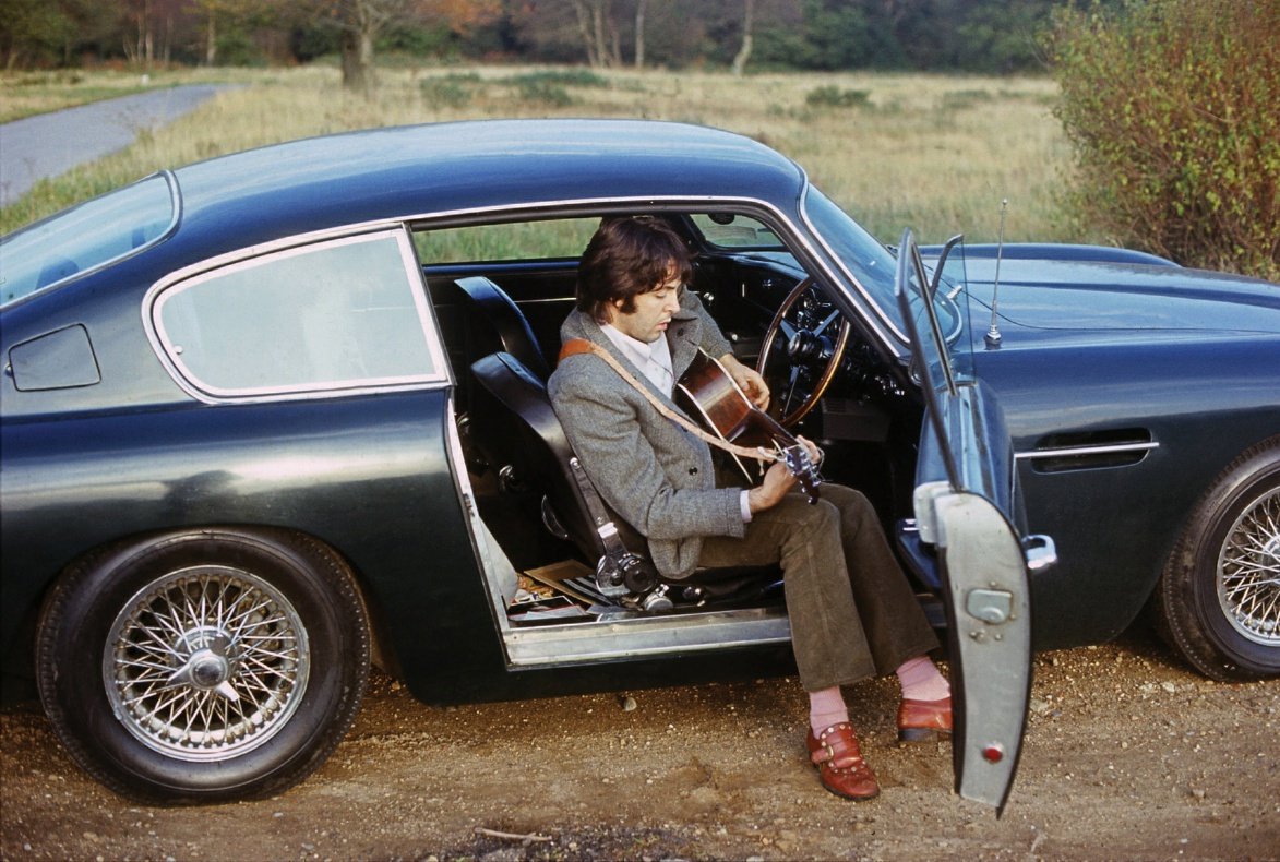 carlosgvizcaino's tweet image. "There’s a photograph of me in the Aston Martin, sitting with the driver’s door open and my feet out. I’ve got my guitar. That’s me writing ‘Two of Us’."

~ Paul McCartney