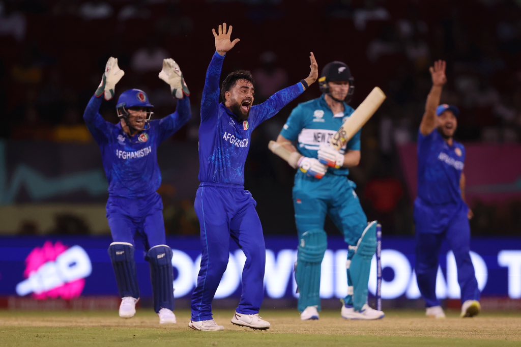 rashidkhan_19's tweet photo. There is no better feeling than this 💙🇦🇫 

Great team effort 

#CWCt20 #ICC https://t.co/8aVioC9JJT