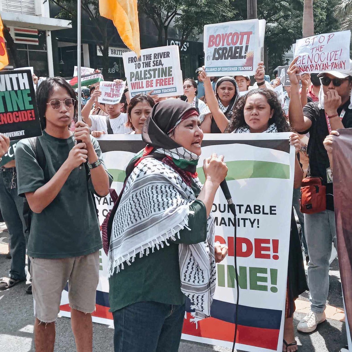 PandaySiningPH's tweet photo. On the 8th month of the ongoing genocide in Palestine, various progressive groups in the Philippines gathered in front of the Israel Embassy with their signboards to call for an end to the genocide. https://t.co/w4Ns0evRyg