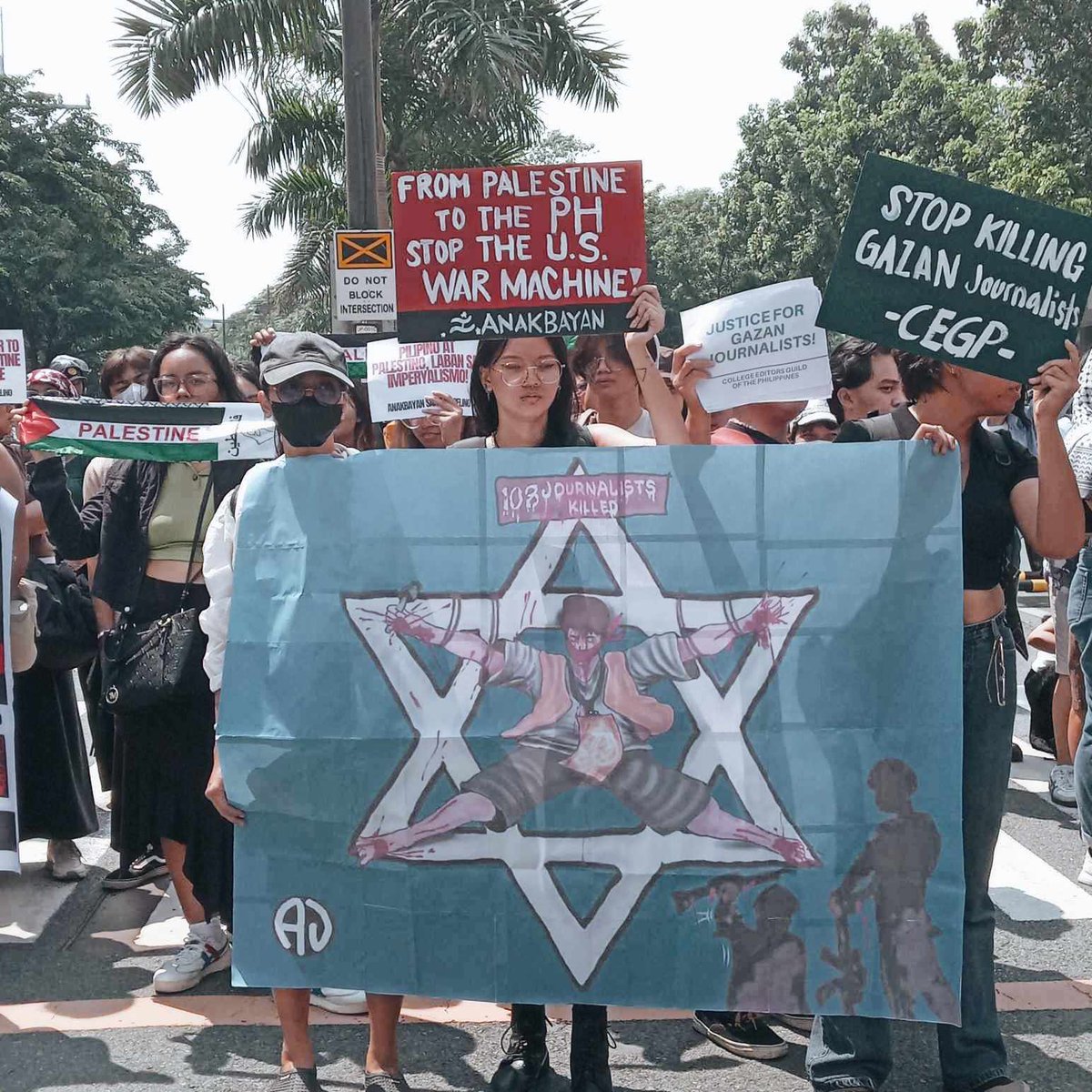 PandaySiningPH's tweet photo. On the 8th month of the ongoing genocide in Palestine, various progressive groups in the Philippines gathered in front of the Israel Embassy with their signboards to call for an end to the genocide. https://t.co/w4Ns0evRyg