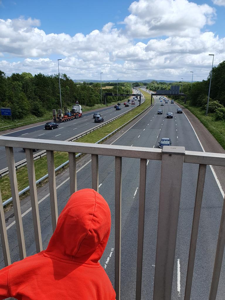 Waiting by junction 32 on M6 for the convoy #Preston #Daveday