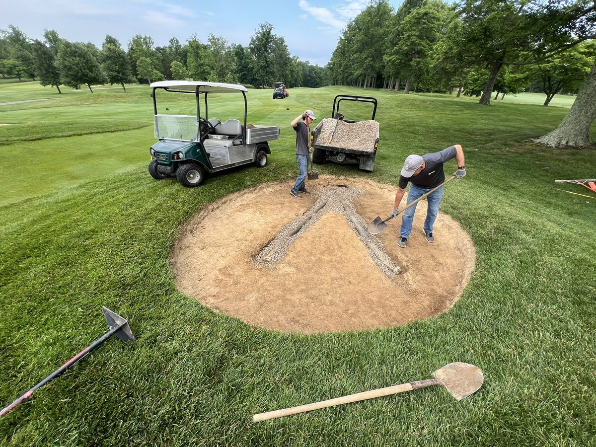 eric_estridge's tweet photo. The team did a great job fixing this bunker that continually held water after a rain event. Shovels were used to remove sand and 4” of clay  to smooth and reduce the overall slope. Drainage was also repaired.
Great job!!
#gcga
#cincysupers 
#gcgcsa https://t.co/6uPLPWAREc
