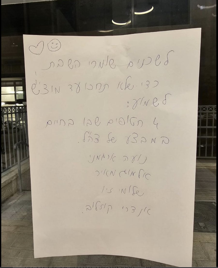 talschneider's tweet photo. The level of excitement in Israel today was so high that secular residents posted handwritten notes with names of the hostages and several details - around neighborhoods &amp; buildings to update their Shabbat observant neighbors. (credit: Hanoch Daum) https://t.co/N2Z9B5BRH1