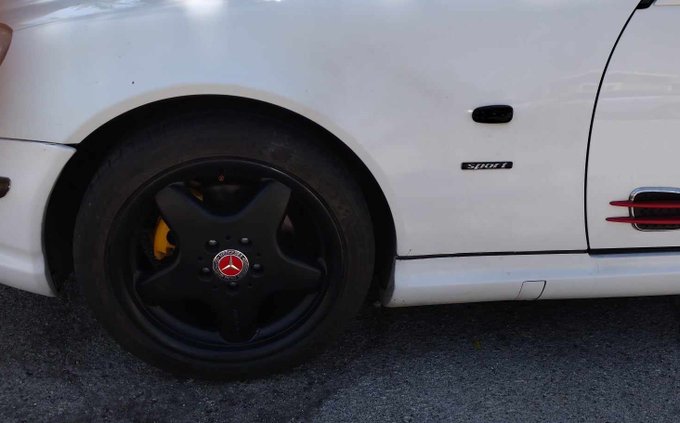 I painted my wheels with black Plasti-Dip today and put new classic red center caps on them. Turned out