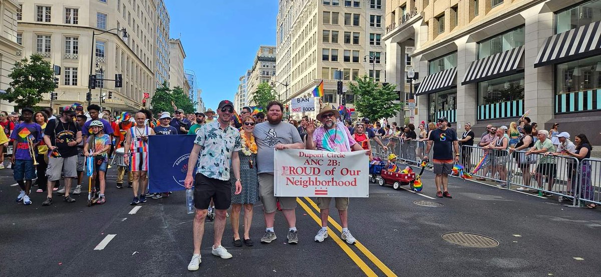 CapitalJeff's tweet photo. The current and previous 2B02 Commissioners carrying the banner (me, @danielmwarwick), and the current and a former 2B Chairs (@AncMeg, also Daniel). And, the Chair of our neighboring ANC 2F (Logan Circle), Joe Florio. Beaucoup Commissionerage! #dcprideparade https://t.co/5qEaCiDB1c