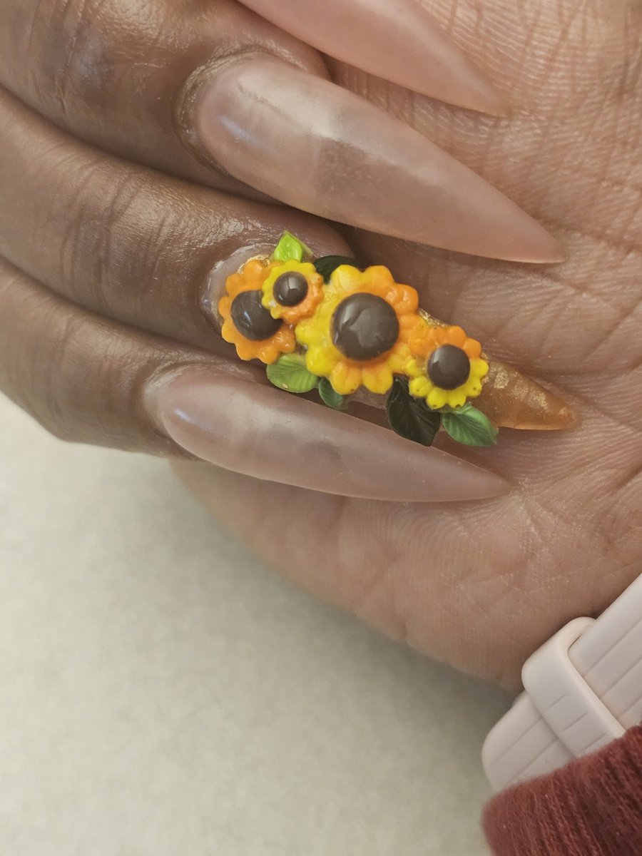 I did two nails.... going from doing my nails all the time to struggling to find the energy to fill in, let alone design....I did a little something  to remind me what love looks like to me....I'm proud of me....🌻