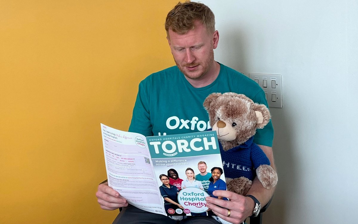 OUHospitals's tweet photo. To round off the 40th #VolunteersWeek, 'Buttons' the (now very tired) OUH #Volunteer Teddy has been back at the Volunteers' Help Desk and making time for a quiet read of the Excellent 'Torch' with @OxHospCharity Jamie 🐻 🥰
#OneTeddyOneOUH #OneTeamOneOUH @volunteeroxon @NCVO https://t.co/zTa2zmWVWl