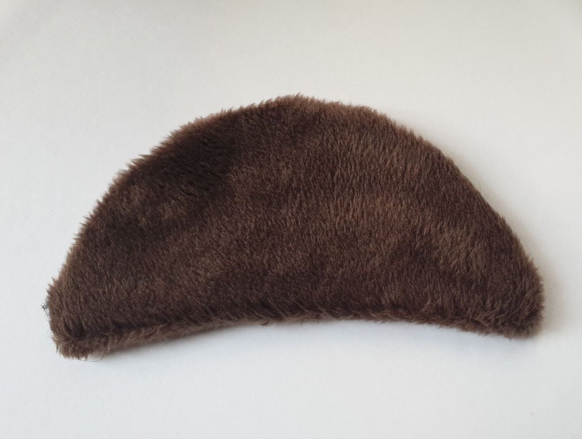 cfconvention's tweet image. We'd like to reunite lost property from the fursuit lounges with their owners:

* 1 handpaw, black with brown pads
* 1 pair of handpaws, black and white with pink pads
* A brown eyelid
* A ducky collar

Get in contact and we can send you your missing parts!