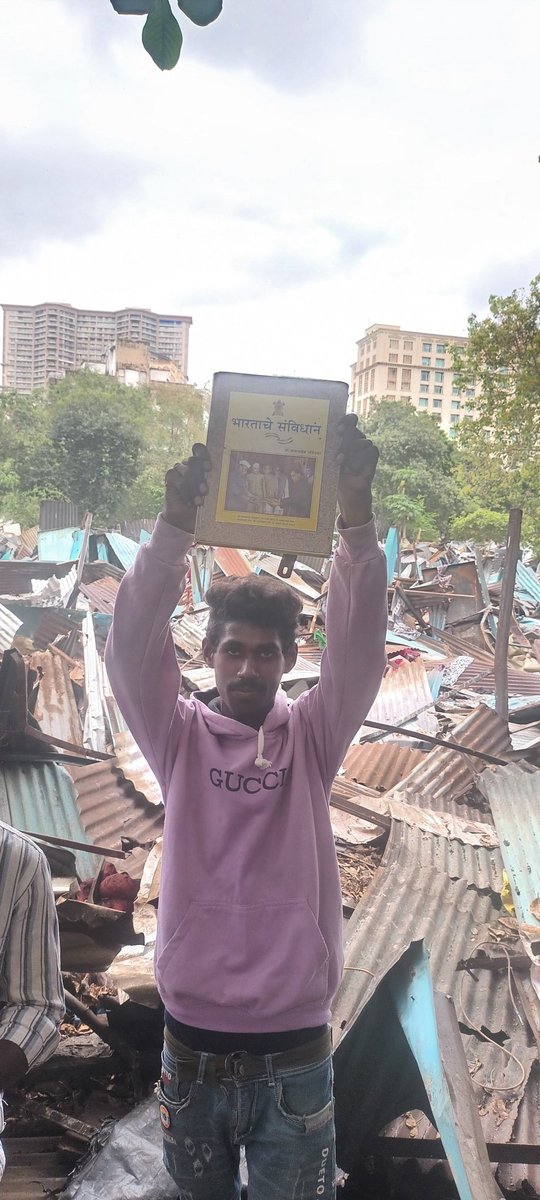 Their homes in Jai Bhim Nagar Powai, where they have lived most of their childhood, were demolished by BMC two days ago. We found them coming out from the rubble today morning with this copy of the Indian Constitution.They went searching for it. Their search for justice continues