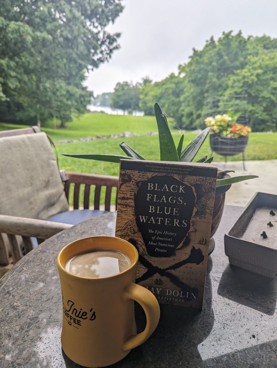 Cup of coffee, a good book, and a morning rain shower...this is good!