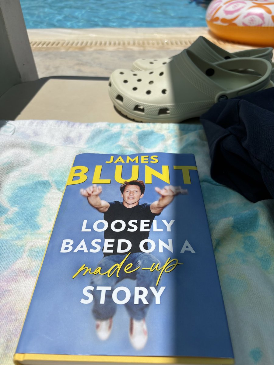Poolside reads courtesy of <a href="/JamesBlunt/">James Blunt</a>.

Those are not my Crocs.