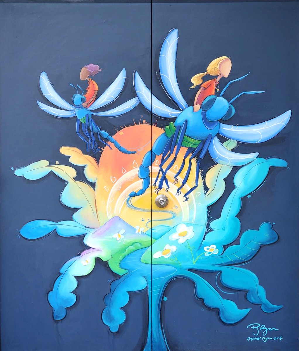 Working today in the wet weather at Leeming Primary. It's been nice spending the weekend on a smaller mural, creating a new adventure entrance into the library.