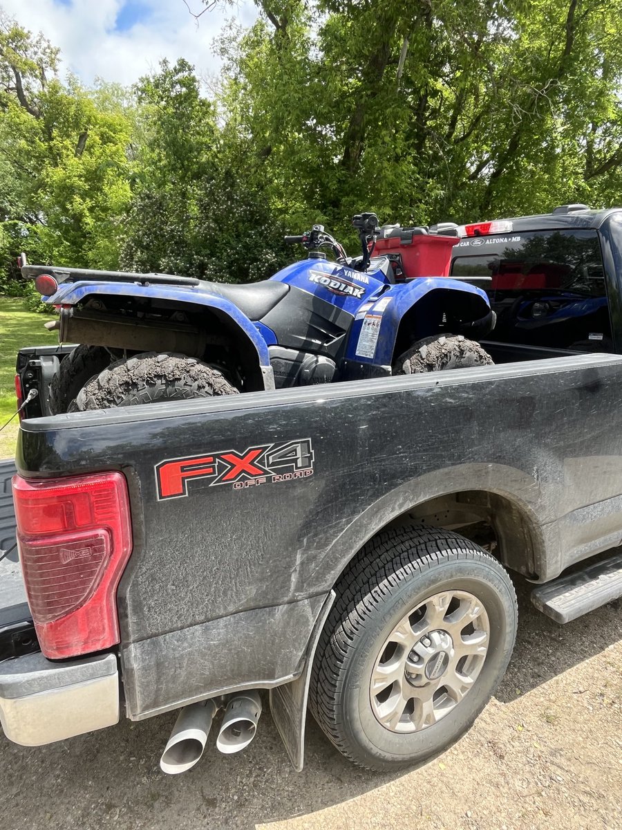 RStoroschuk's tweet photo. I have a little Yamaha450 with an F250 for field scouting. Daughter has an 850 Can-Am with an F150. Do we switch quads or trucks? #mismatch https://t.co/jm7lAizReD