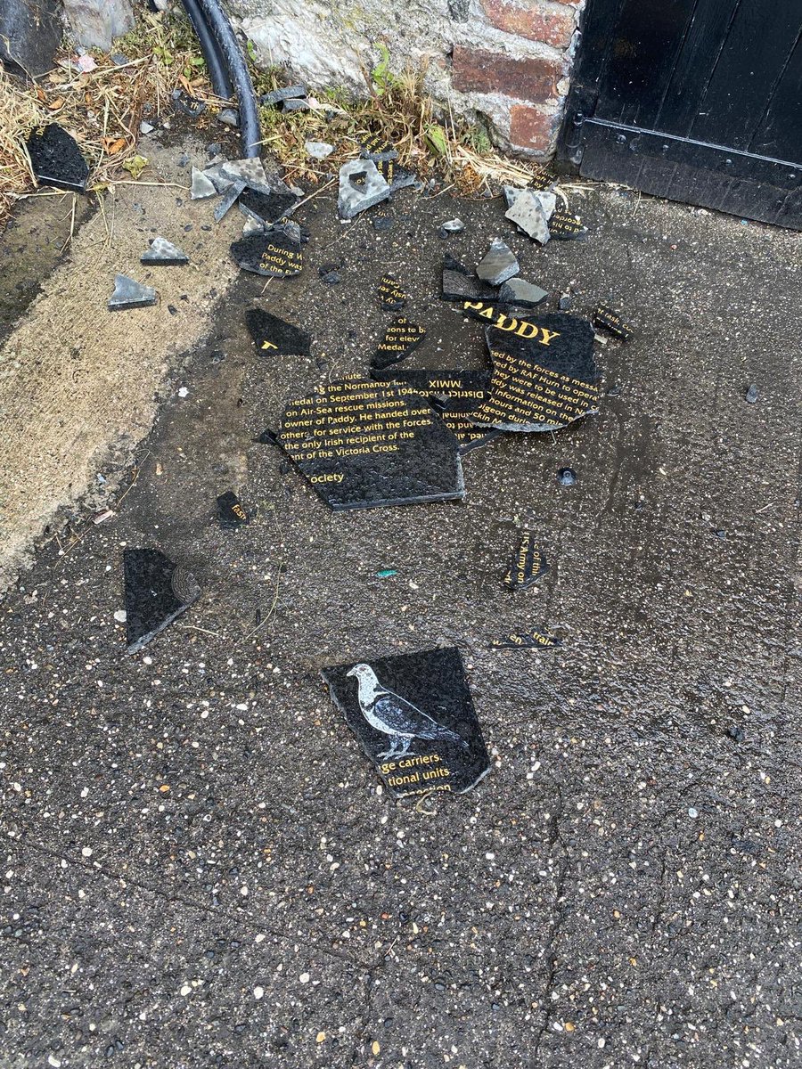 DannyDonnelly1's tweet photo. I am disgusted that the memorial to Paddy the Pigeon was smashed last night in Carnlough. Paddy the first pigeon back to England reporting the success of the D Day Landings. Smashing the memorial is despicable. If anyone has any information please contact PSNI on 101. https://t.co/BHxUt6qZcU