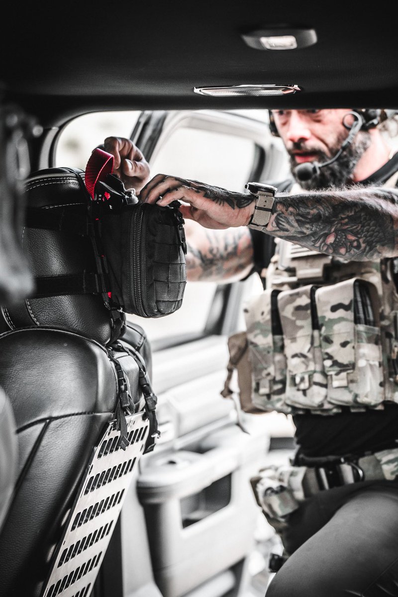 For those who conduct operations in and around vehicles, the Drive-by kit is the single easiest piece of kit that allows direct access to spare magazines, medical equipment, explosives, and other essential equipment all within an arms distance of your fighting position.